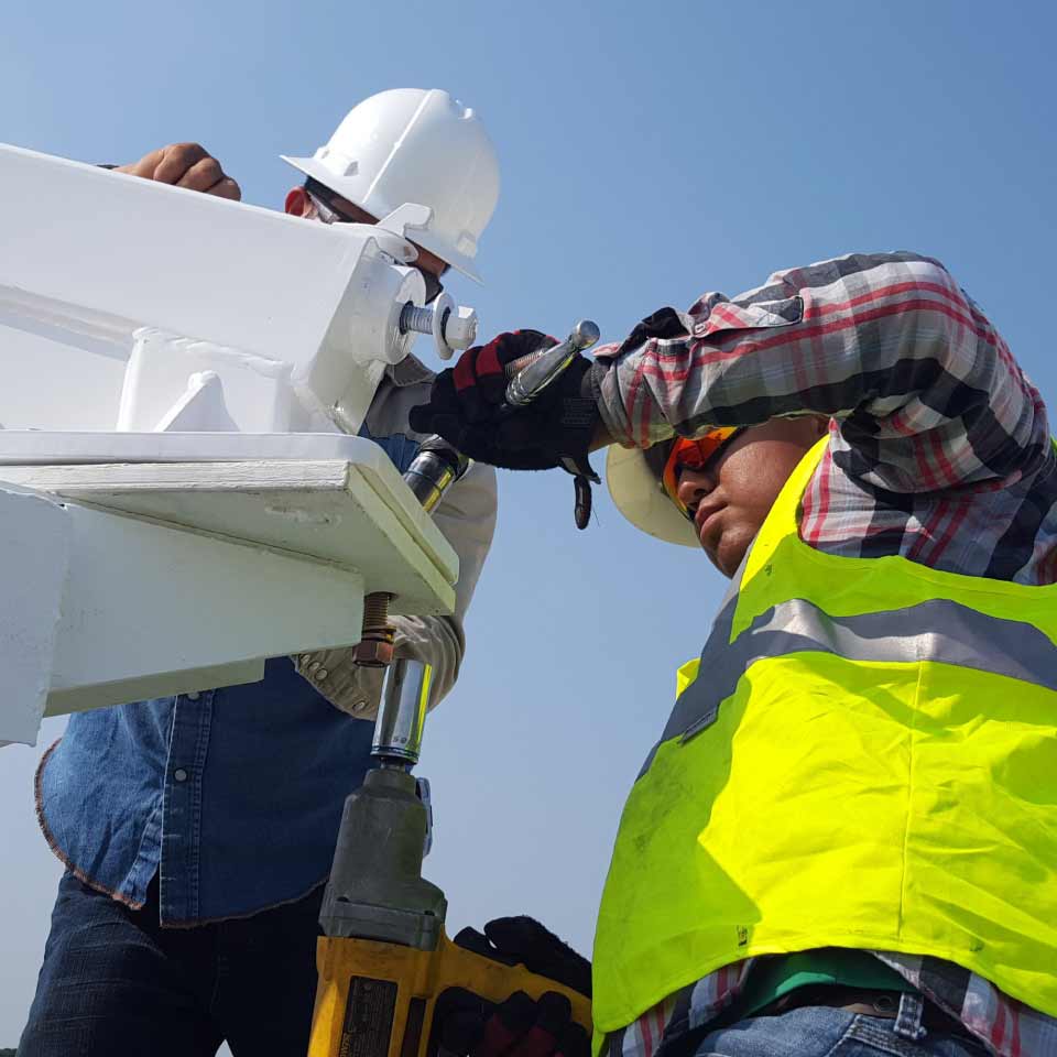 Workers assembling a structure