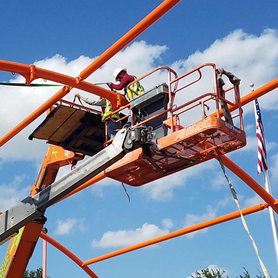 Workers assembling a structure