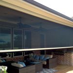 Photo of roller shades out on the patio